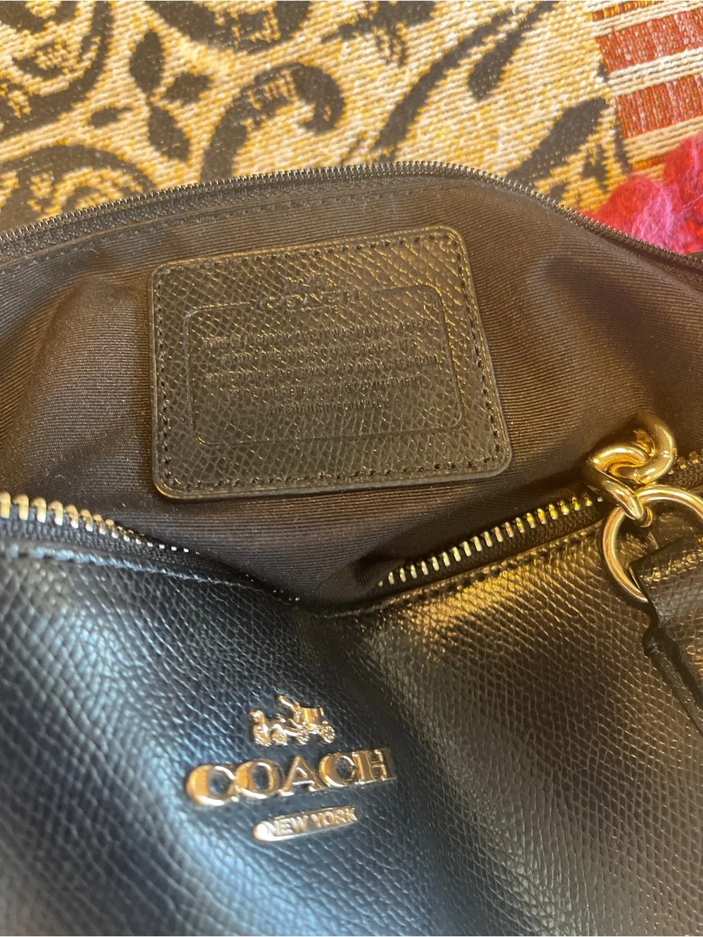 Coach sleek black